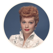 Photo of women smiling named Lucille Ball known for her red hair
